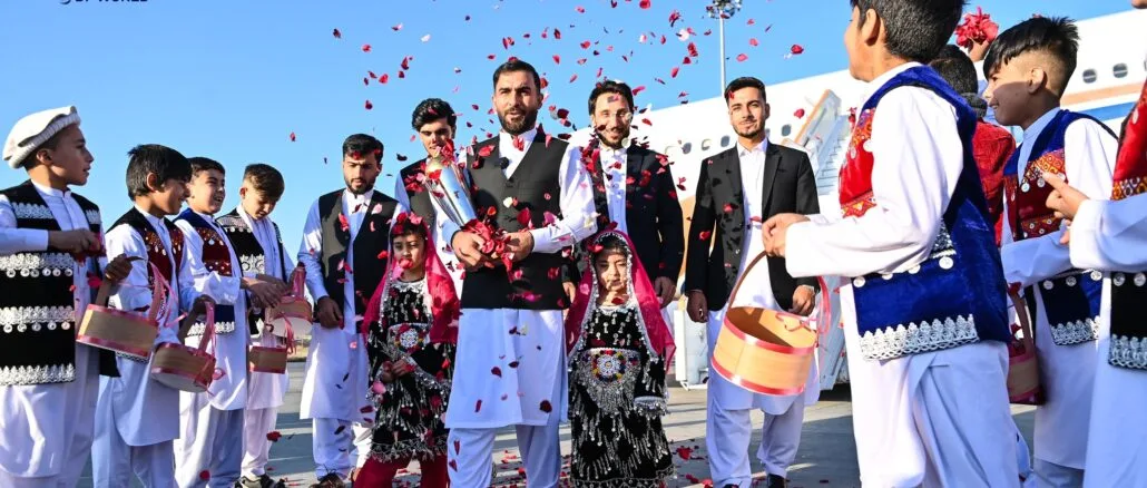 ICC Champions Trophy Arrival Ceremony Children dressed in traditional Afghan attire scatter rose petals to celebrate the ICC Champions Trophy during its December 2024 countrywide tour.