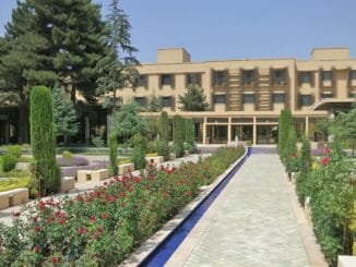 Kabul Serena Hotel with its landscaped garden and walkway, captured in 2013.