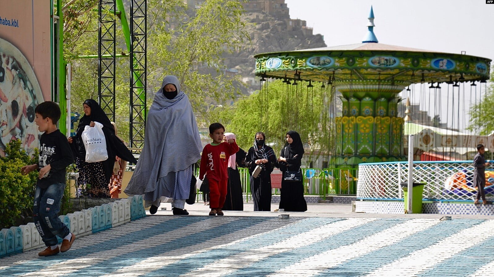 The Taliban's decree from May 2022, which advises women against unnecessary outings, states that if they must leave their homes, they should be accompanied by a Mahram—a male family member as per Islamic tradition.
